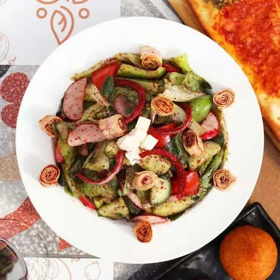 Fattoush salad in a white bowl